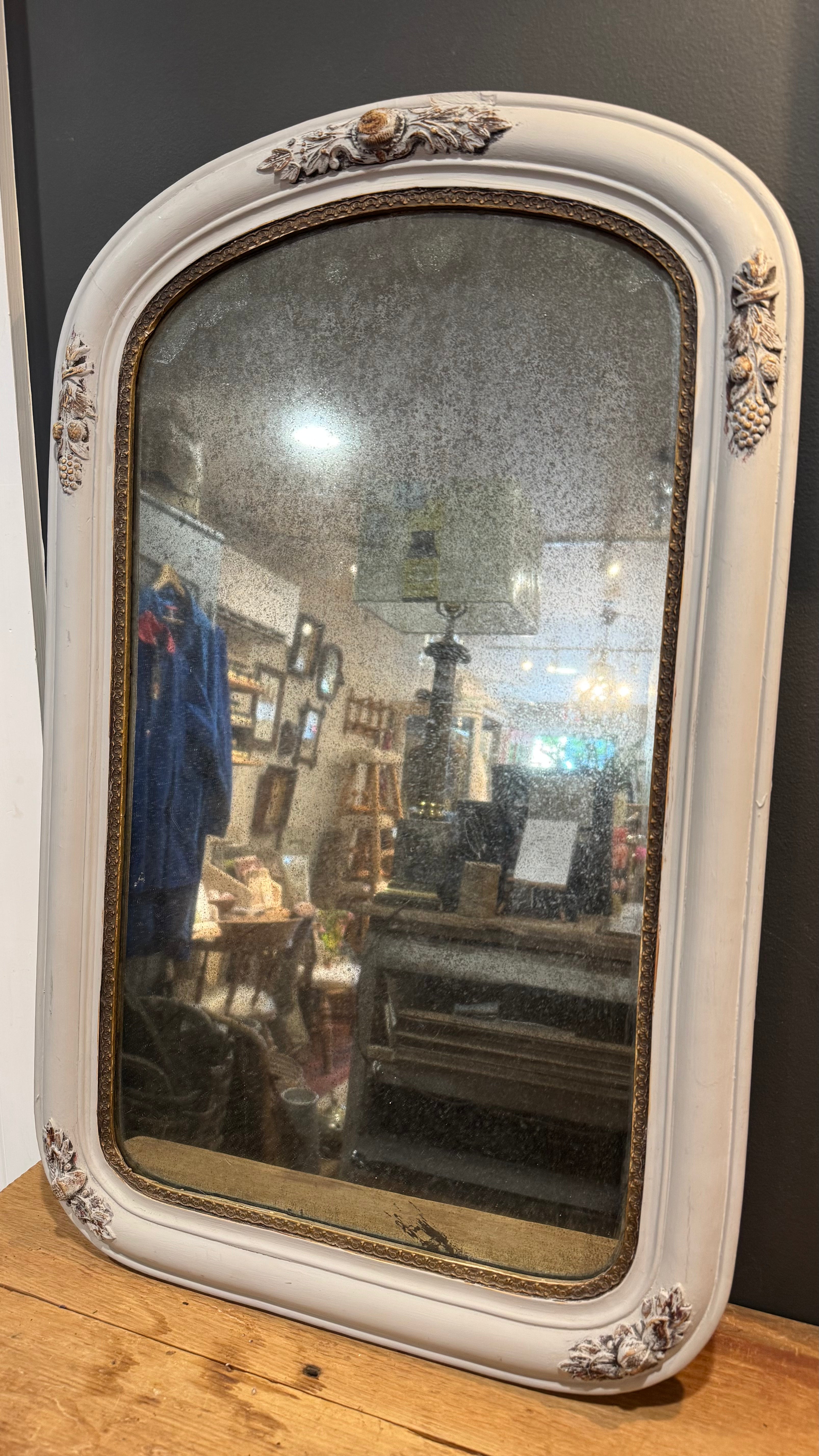 Vintage Arched Foxed Mirror With Acorn Motif