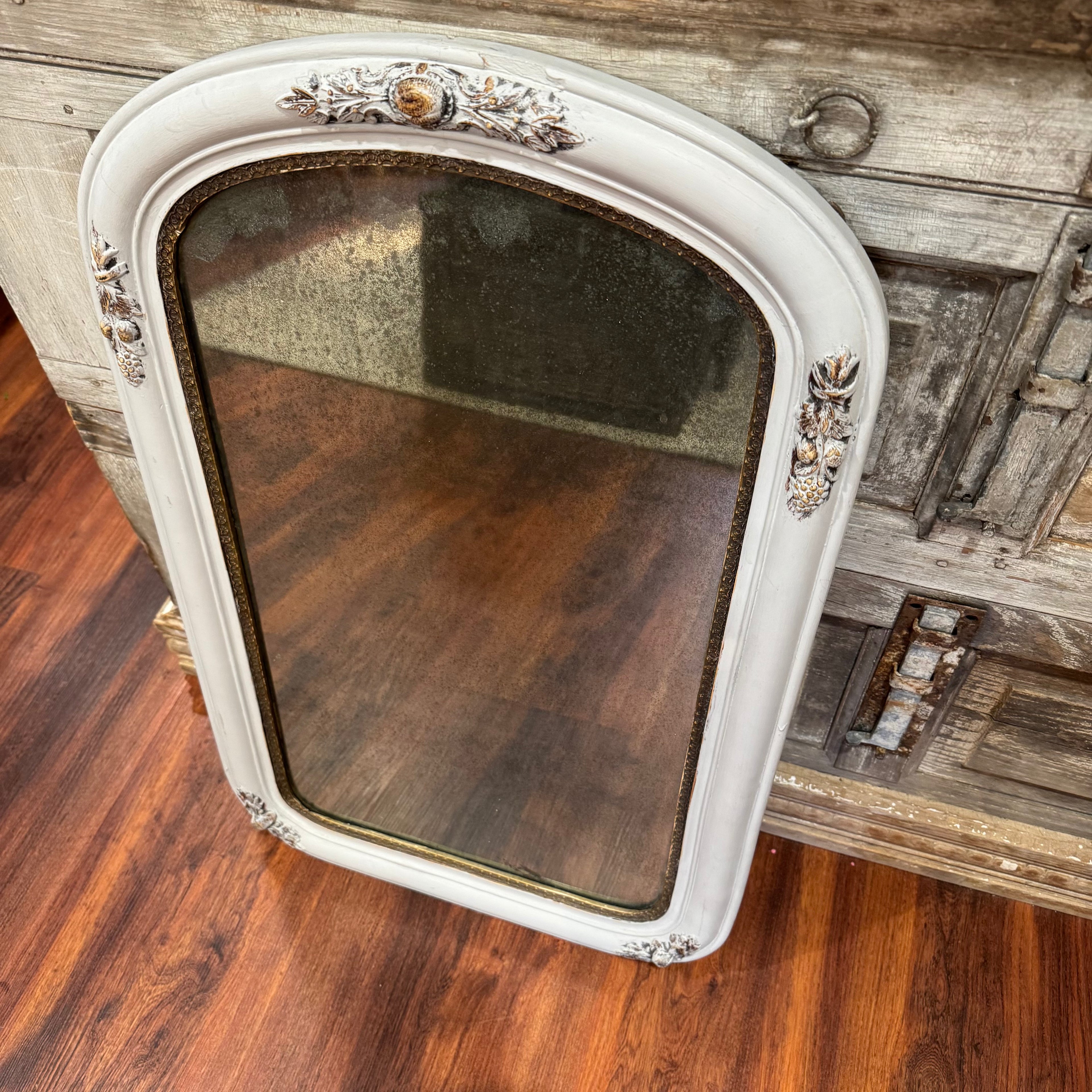 Vintage Arched Foxed Mirror With Acorn Motif