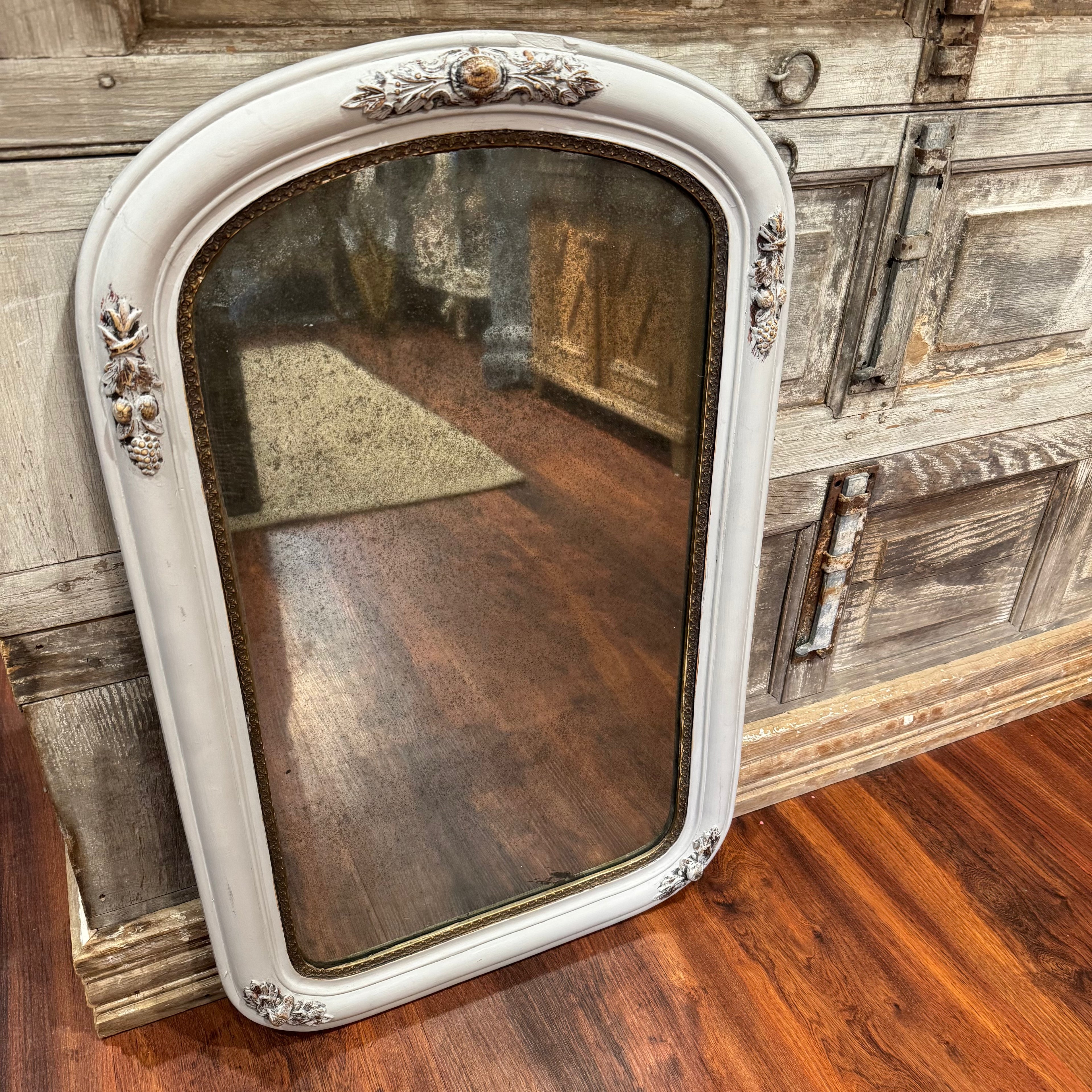Vintage Arched Foxed Mirror With Acorn Motif